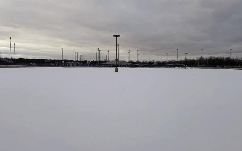 This view from the front of Grace Fellowship looking toward the Lampasas High School oncampus stadium shows a snow-filled parking lot on Sunday. DAVID STONE | COURTESY PHOTO