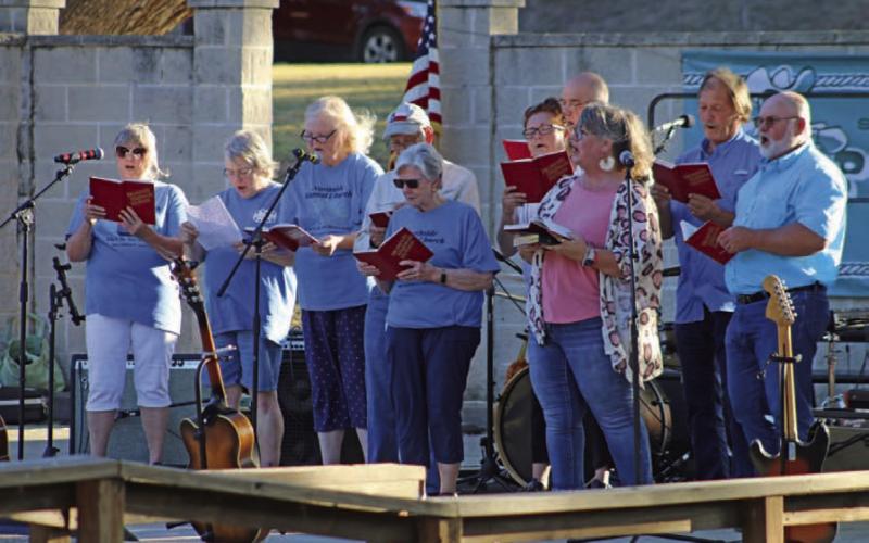 The Sunshine Singers from Northside Baptist Church in Lampasas perform a medley of hymns for the audience at the Ruth Eakin Outdoor Theater. MASON HINES | DISPATCH RECORD