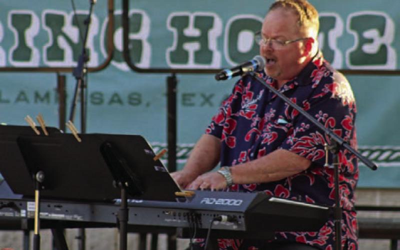Neill Herndon of First Baptist Church sings and plays songs of praise at Gospel Night. MASON HINES | DISPATCH RECORD