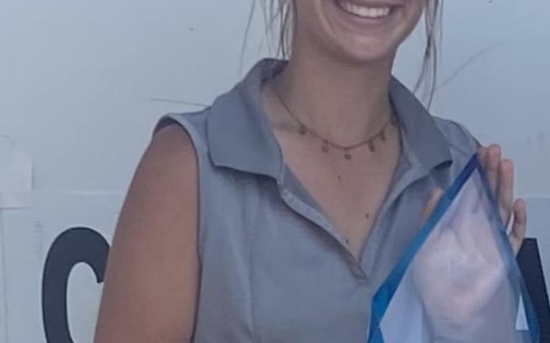 Local golfer tops her division