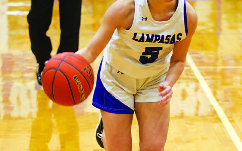 HUNTER KING | DISPATCH RECORD Chloe Thorp dribbles toward the baseline against Burnet.