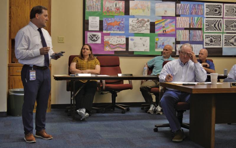At left, Lampasas Middle School Principal Wes Graham provides a presentation to school board members during Monday’s meeting. ERICK MITCHELL | DISPATCH RECORD
