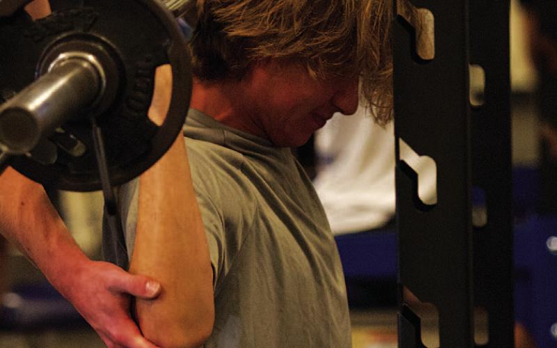HUNTER KING | DISPATCH RECORD Jax Pratus lifts weight on the final Monday of SWAT for the summer.