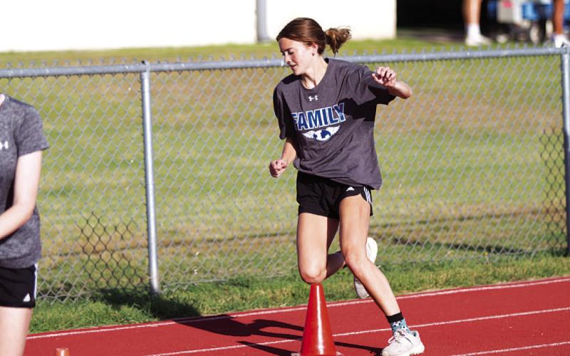 Hailey Palmer runs through an agility drill at SWAT conditioning at Lampasas High School. HUNTER KING | DISPATCH RECORD
