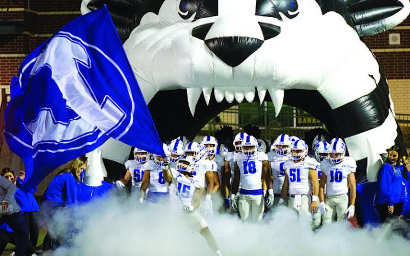 The Badgers emerge from the tunnel to begin each game. They will hit the field in Boerne tonight in the same fashion. HUNTER KING | DISPATCH RECORD