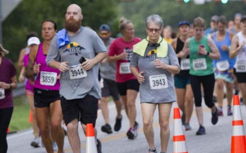 A massive crowd of 350-400 runners competed Saturday in the Spring Ho races, which included 10K, 5K and one-mile routes. JEFF LOWE | DISPATCH RECORD