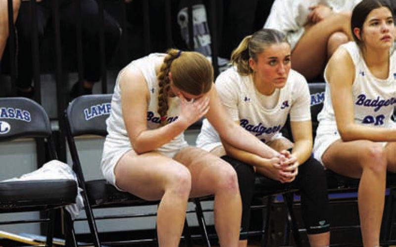 Kari Kepler, left, and Payton Crawford could barely watch during the thriller. FILE PHOTO