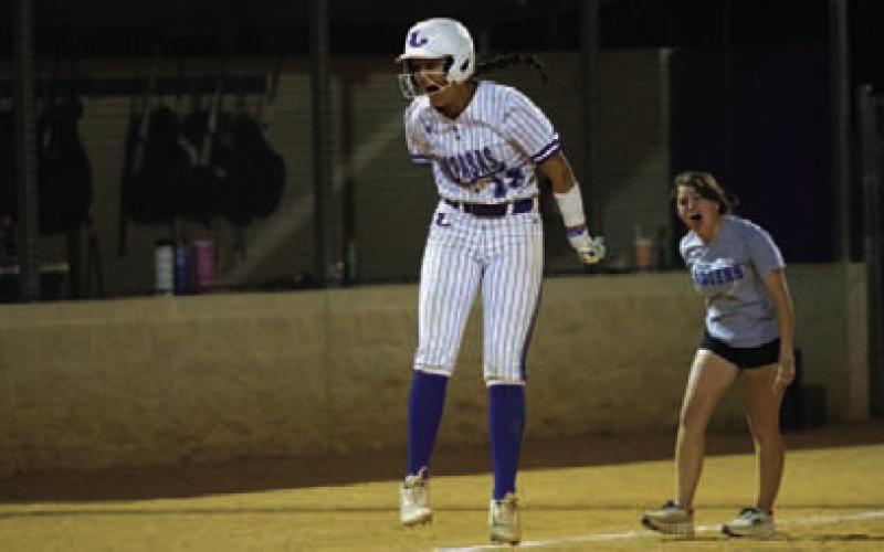 Madison Magilke celebrates on her way to home plate after the walk-off grand slam. FILE PHOTO