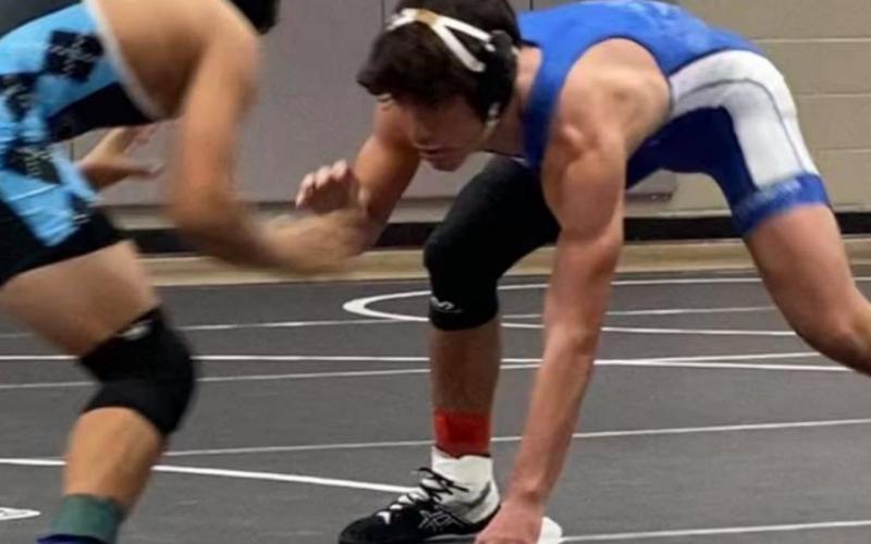 Landon DiBattiste posted a winning record for the day as the Badgers wrestled in College Station. LAURA MARTELL | COURTESY PHOTO