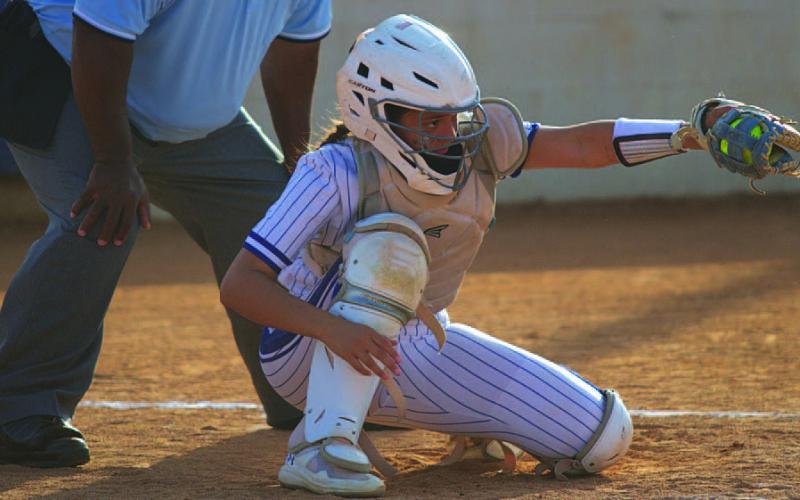Madison Magilke frames a pitch from Brooklyn Farmer during Tuesday’s contest. HUNTER KING | DISPATCH RECORD