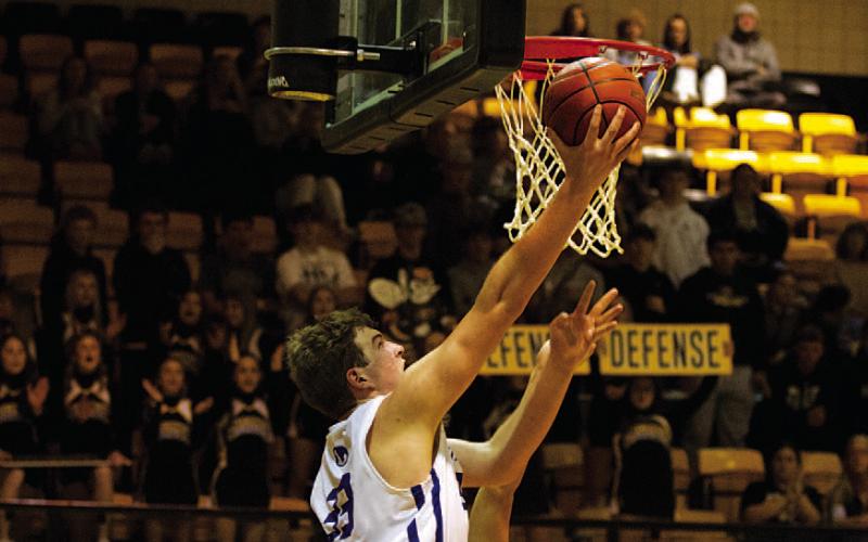 HUNTER KING | DISPATCH RECORD Beau Patterson rises up to finish two of his 22 points in Tuesday’s playoff game.