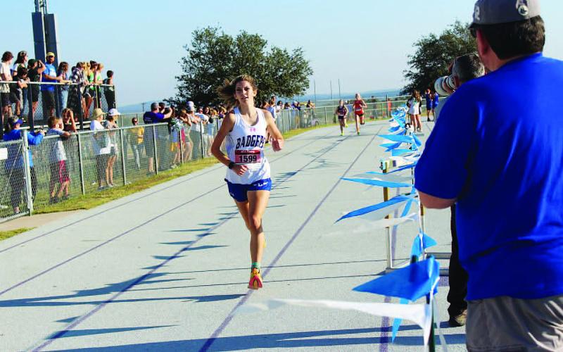 Nyla Long heads to the finish line where she crossed it in fourth place at the district meet. COURTESY PHOTO