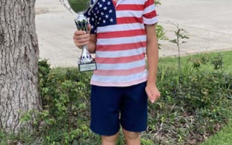 Local golfer wins division at junior championship tournament
