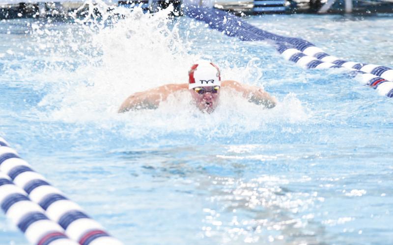 Jase Pinckney swims in the 100-yard butterfly, the event he will be competing in at the Olympic trials. COURTESY PHOTO