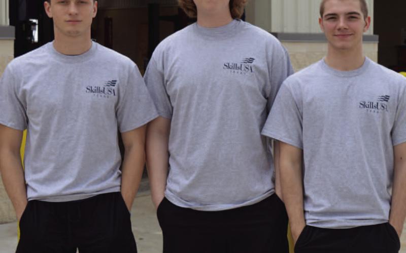 LHS automotive students, left to right, Sean Smith, Ryan Dane and Shawn Roberts are advancing to the Skills USA Texas state competition in April with their Scorpion go-kart build. ERICK MITCHELL | DISPATCH RECORD