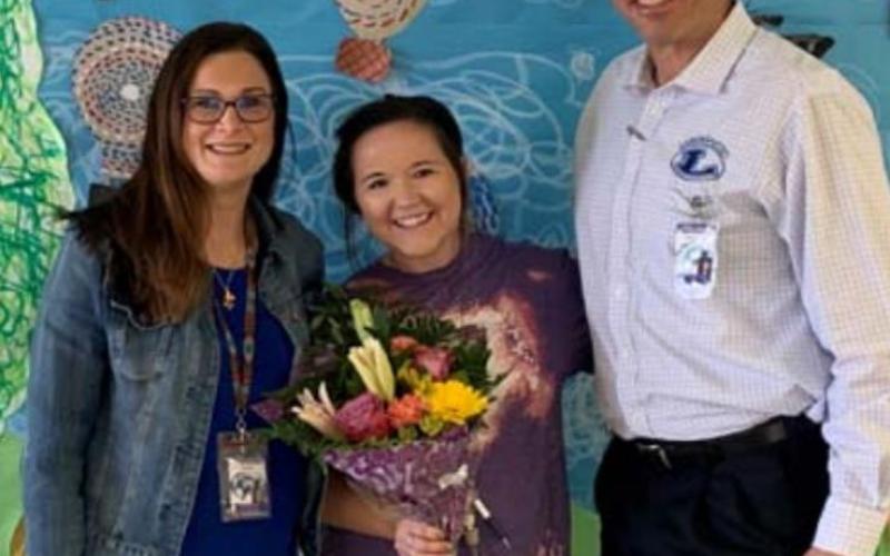 Chelsea Posey, center, was named the 2022 Elementary Teacher of the Year for the Lampasas Independent School District. Pictured with her are Hanna Springs Elementary School Principal Lindsay Duhon and Superintendent Dr. Chane Rascoe. COURTESY PHOTO