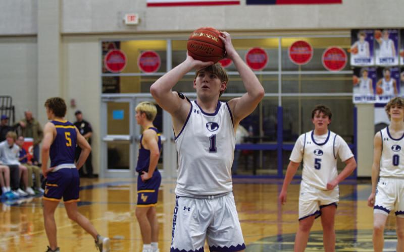 Rawlin Smith shoots a free throw late in the Badgers’ win. HUNTER KING | DISPATCH RECORD
