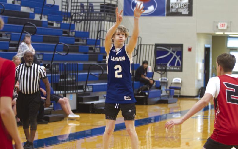 Peyton Sisson shoots over a Salado defender in game one on the final day of spring league. HUNTER KING | DISPATCH RECORD
