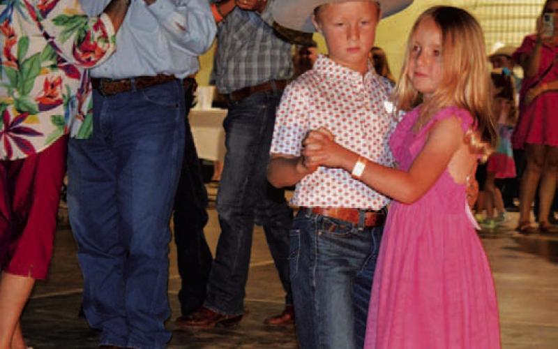 Youngsters Chase Hart and Maddie Gouak show their best moves on the dance floor and take third place in the waltz category. ERICK MITCHELL | DISPATCH RECORD
