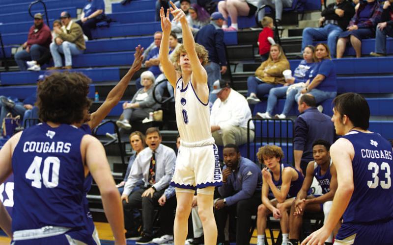 Peyton Sisson shoots over an outstreched Jarrell defender during last Friday’s contest. HUNTER KING | DISPATCH RECORD