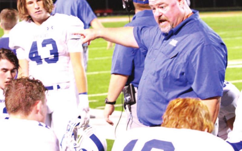 Sam Waldrip talks to his defense during the Badgers’ 2018 football season. FILE PHOTO