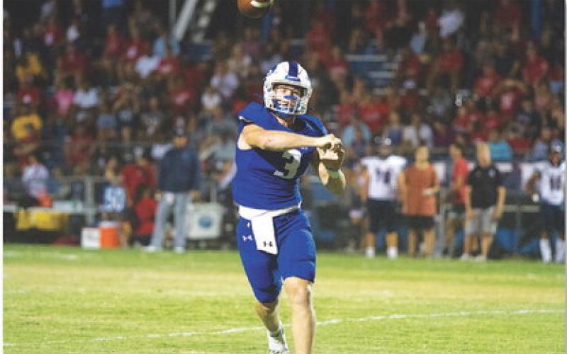 Reed Jerome tosses a pass toward the end zone last Friday night. With his six touchdowns, Jerome was named David Smoak’s Quarterback of the Week for Central Texas. HUNTER KING | DISPATCH RECORD