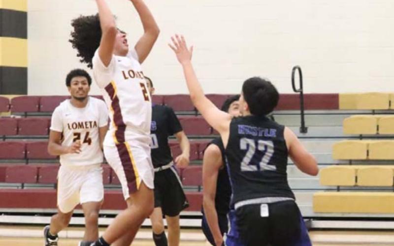 Tim Juarez goes up over a San Angelo Lakeview defender during the Hornets’ loss last week. JESSICA MALDONADO | DISPATCH RECORD