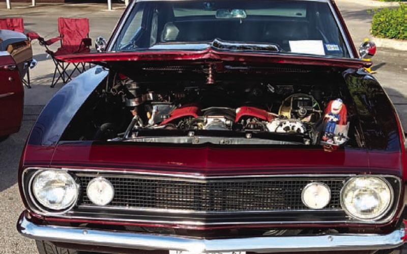 At left: Twenty-nine awards were given out at the recent Classics at the Classic Car Show, which featured vehicles from the 1990s and earlier. A Veterans Choice Award this year went to Wayne McFarland for his 1968 Chevelle with a blower street rod.