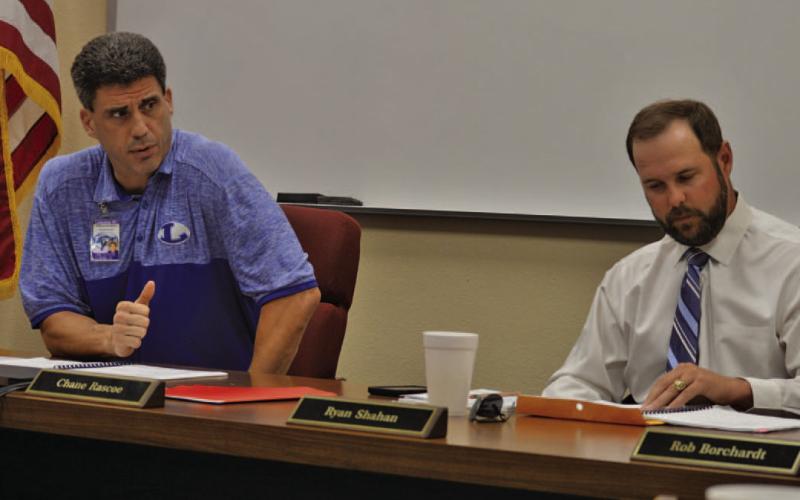 At left, LISD Superintendent Dr. Chane Rascoe speaks to school board members as Board President Ryan Shahan looks on during Monday’s regular meeting. ERICK MITCHELL | DISPATCH RECORD