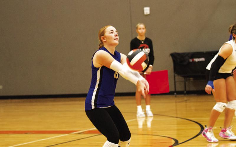 Caitlyn Bengsch makes a pass to a teammate during an earlier match.