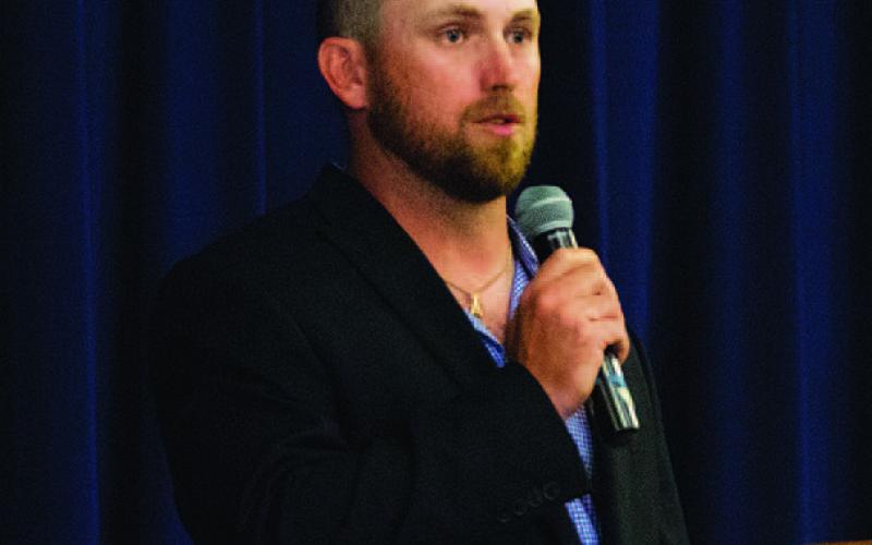 HUNTER KING | DISPATCH RECORD Baseball coach Chance Evans addresses the audience.