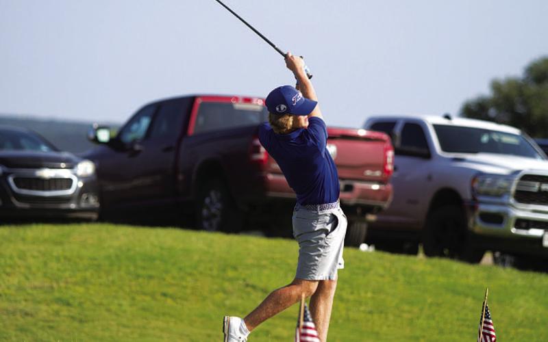 HUNTER KING | DISPATCH RECORD Nick Haas tees off on the first hole of his second round of the state golf tournament on Tuesday.