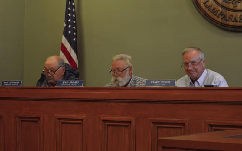 County Judge Randy Hoyer, at right, is shown with Precinct 4 Commissioner Mark Rainwater, left, and Precinct 3 Commissioner Lewis Bridges. Hoyer discussed with the Commissioners Court what he had learned at a recent meeting about the advantages of creating a regional water supply. ERICK MITCHELL | DISPATCH RECORD