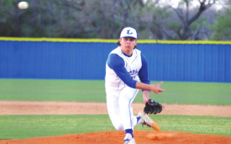 Tak Stinnett releases a curveball during last Friday’s game against Brownwood. He threw six shutout innings in the contest. HUNTER KING | DISPATCH RECORD
