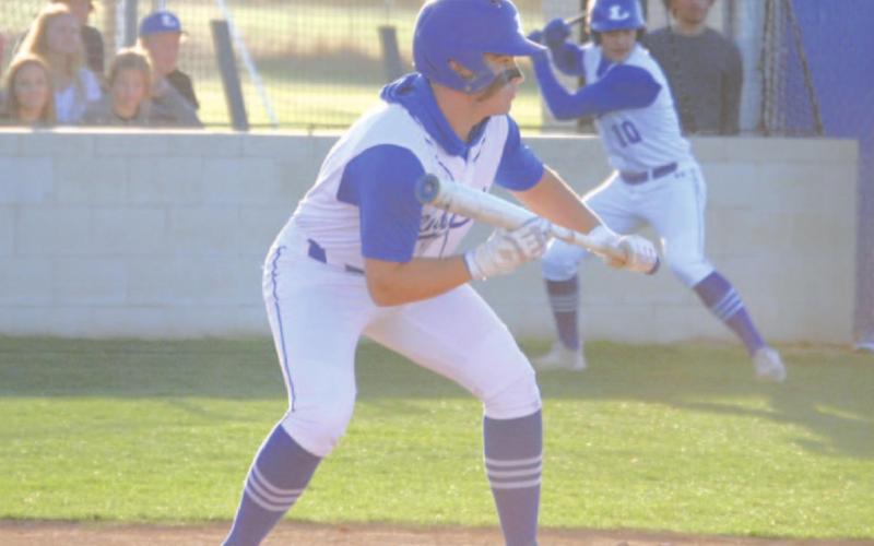 Dax Brookreson squares to bunt in the Badgers’ district game against Brownwood. HUNTER KING | DISPATCH RECORD