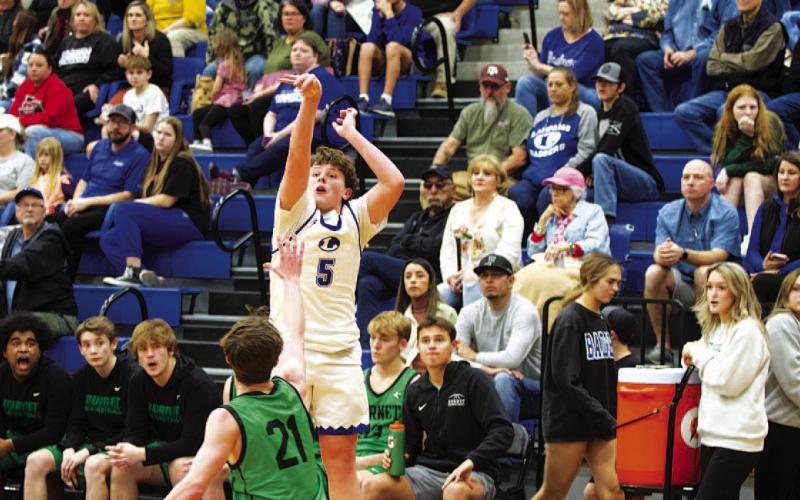 HUNTER KING | DISPATCH RECORD Aidan Nuckles shoots from the left wing in the first half of Tuesday’s win.