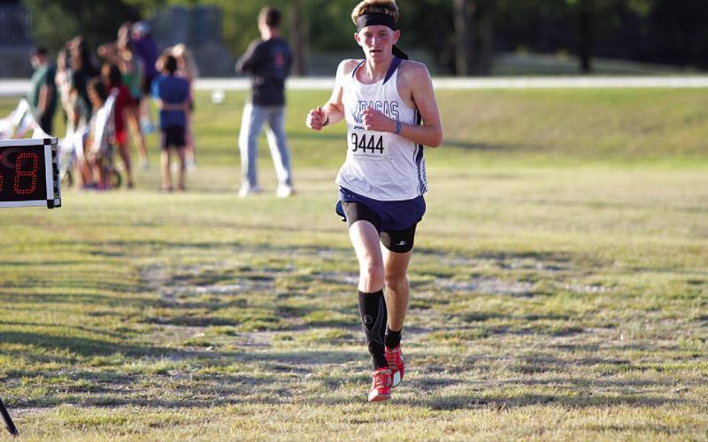 John Keyes was the first boy to cross the finish line for the Badgers on Tuesday. HUNTER KING | DISPATCH RECORD