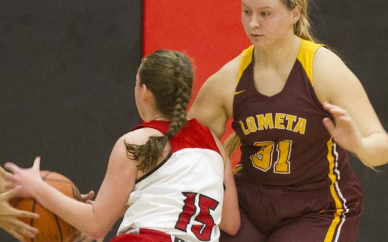Sierra Tower (31) shown in a previous game, gave the Lady Hornets their first lead with a fourthquarter three-pointer at Cherokee. JEFF LOWE | DISPATCH RECORD