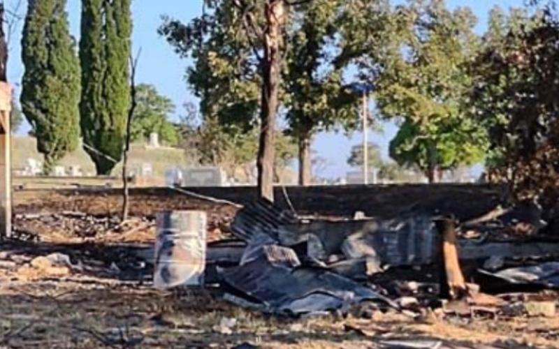 A building in the 1000 block of West Avenue B was destroyed Wednesday when flames in barrels outside the building caught the structure on fire, Lampasas Fire Chief Jeff Smith said. DAVID LOWE | DISPATCH RECORD