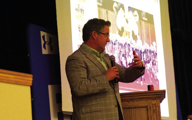 HUNTER KING | DISPATCH RECORD Troy Rogers opens the 2025 awards banquet at the high school cafeteria.