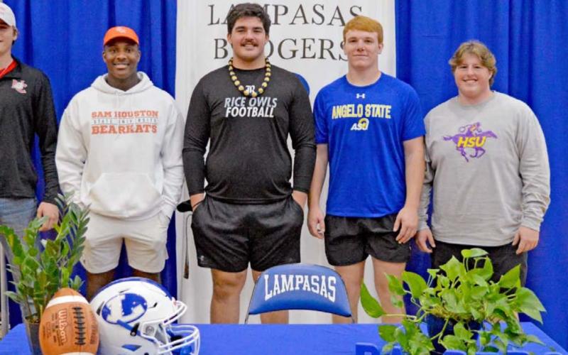 Badger seniors who signed with college programs on Wednesady include, left to right, receiver Lane Haviland, Navarro College; receiver Mike Murray Jr., Sam Houston State; guard John Long, Rice University; defensive end Owen Seaver, Angelo State University; and center Hayden Waldrip, Hardin-Simmons University. JEFF LOWE | DISPATCH RECORD