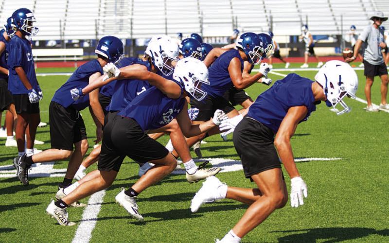 All the practices in temperatures over 100 degrees has led up to tonight when the Badgers take the field in the season opener. HUNTER KING | DISPATCH RECORD