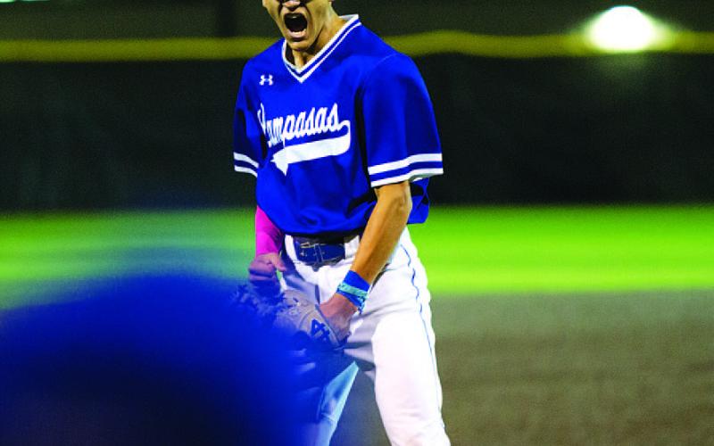 Kade Landry screams after the final out was recorded last Friday night. HUNTER KING | DISPATCH RECORD