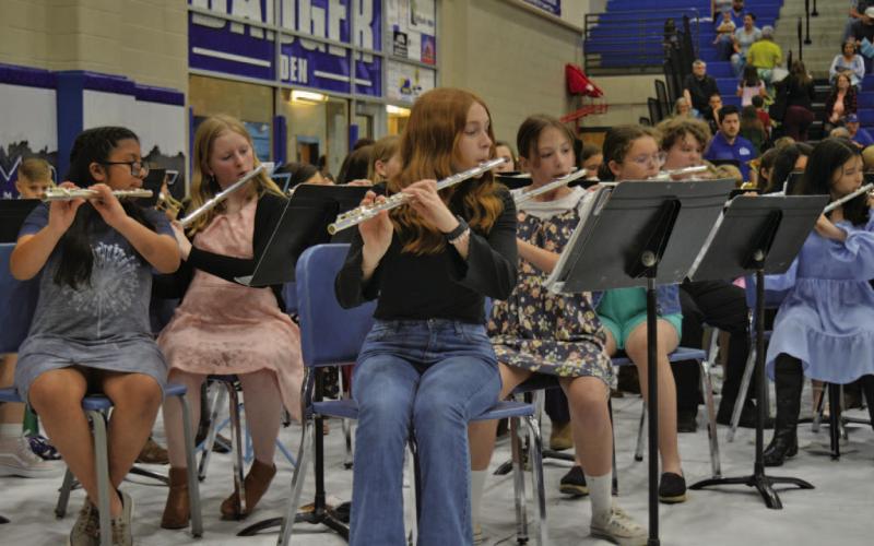 The flute section of the Lampasas Middle School Beginner Band performs “Guiro Hero” during the annual spring concert on Thursday. ERICK MITCHELL | DISPATCH RECORD