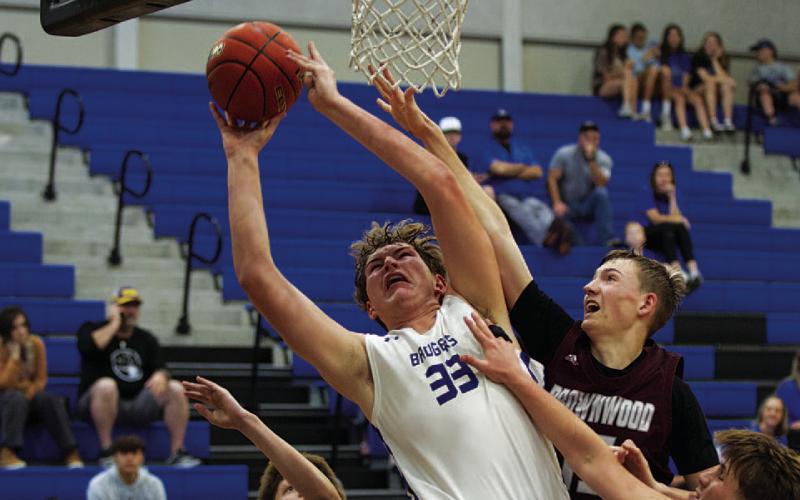 HUNTER KING | DISPATCH RECORD Beau Patterson finishes through contact from Brownwood defenders.