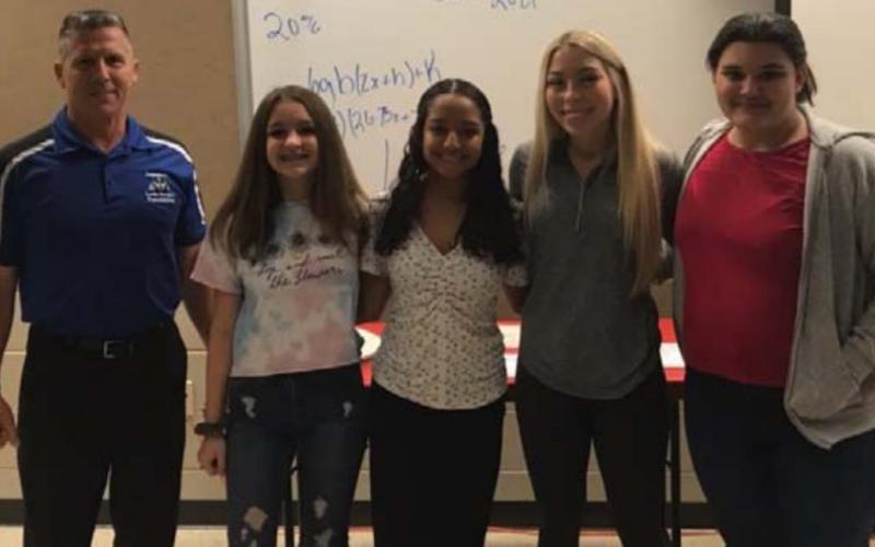 LHS girls’ powerlifting coach Duane Young, far left, has had athletes qualify for state in eight of the past nine years. This year’s qualifiers are shown with Young: Lauren Hollace, Nimsi Vergara, Alyssa Ayers and Lila Walling. COURTESY PHOTO