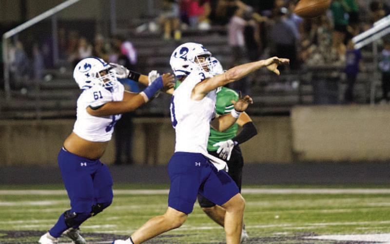 Reed Jerome launches a pass to Jaden McElwain for the game-winning touchdown. HUNTER KING | DISPATCH RECORD