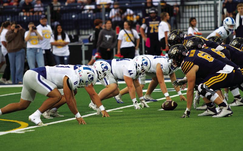 The Lampasas defensive line prepares to rush before the ball is snapped. HUNTER KING | DISPATCH RECORD