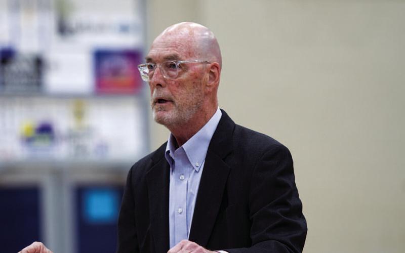 Bob Davis handed out awards to the Lady Badgers at the high school gym. HUNTER KING | DISPATCH RECORD