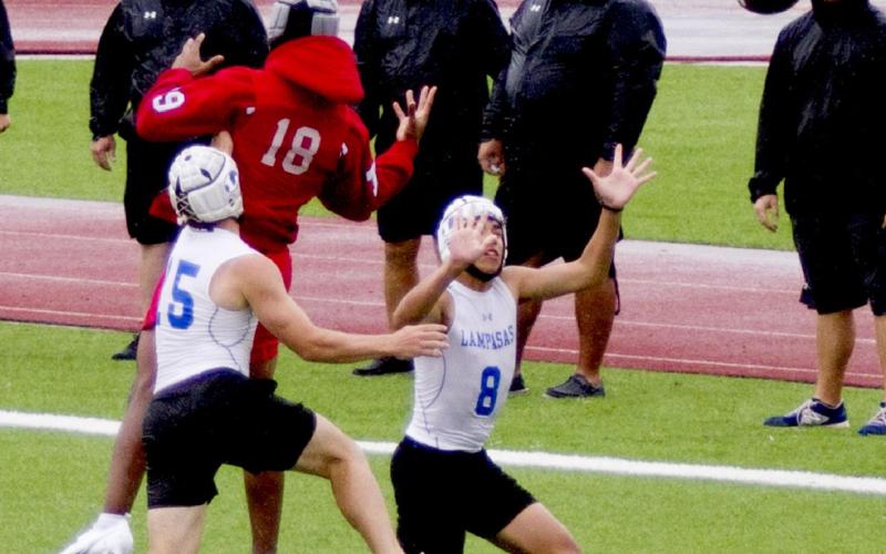 Badgers Case Brister, at left, and Ryker Morua break up a pass in the end zone against Lake Belton in a shutout win on Saturday. JEFF LOWE | DISPATCH RECORD